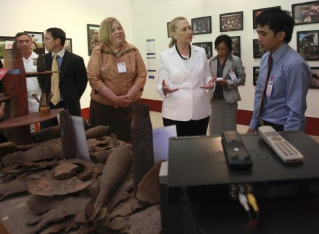 U.S. Secretary of State Hillary Clinton (3rd R) visits the Cooperative Orthotic and Prosthetic Enterprise (COPE) visitor center in Vientiane July 11, 2012. COPE is a non-profit organisation that provides access to orthotic and prosthetic devices and rehabilitation services, in partnership with the National Rehabilitation Centre and provincial rehabilitation centres, according to its website. REUTERS/Phoonsab Thevongsa  (LAOS - Tags: HEALTH SOCIETY POLITICS)